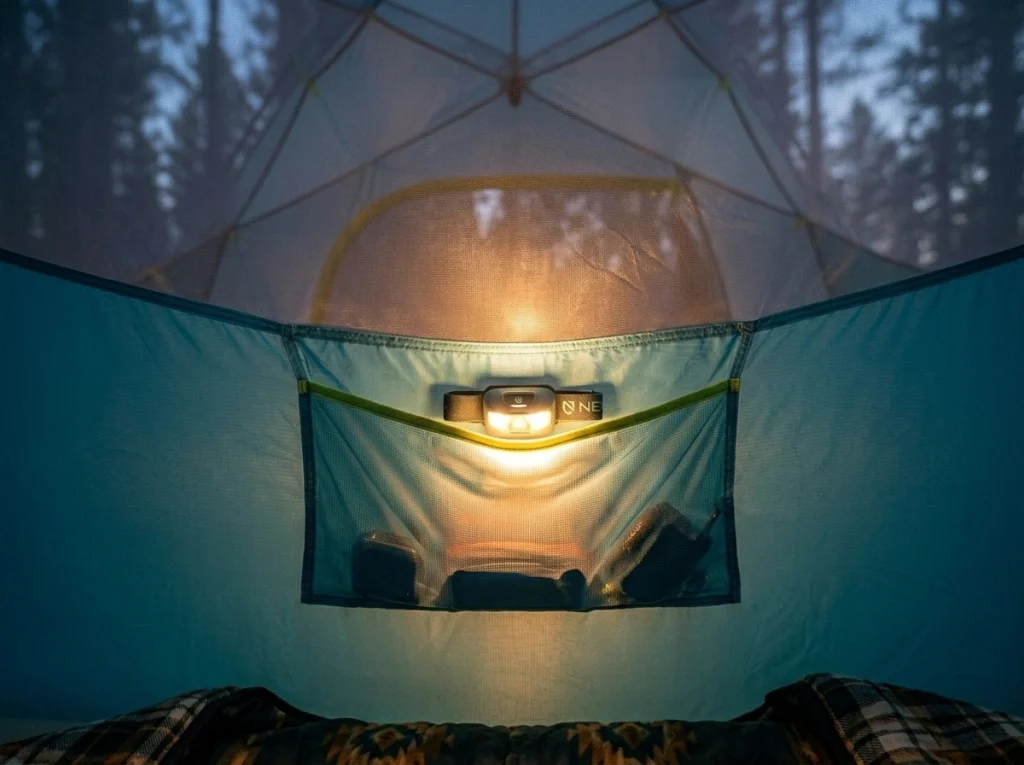 NEMO Aurora Highrise 4P nightlight pocket with headlamp glowing